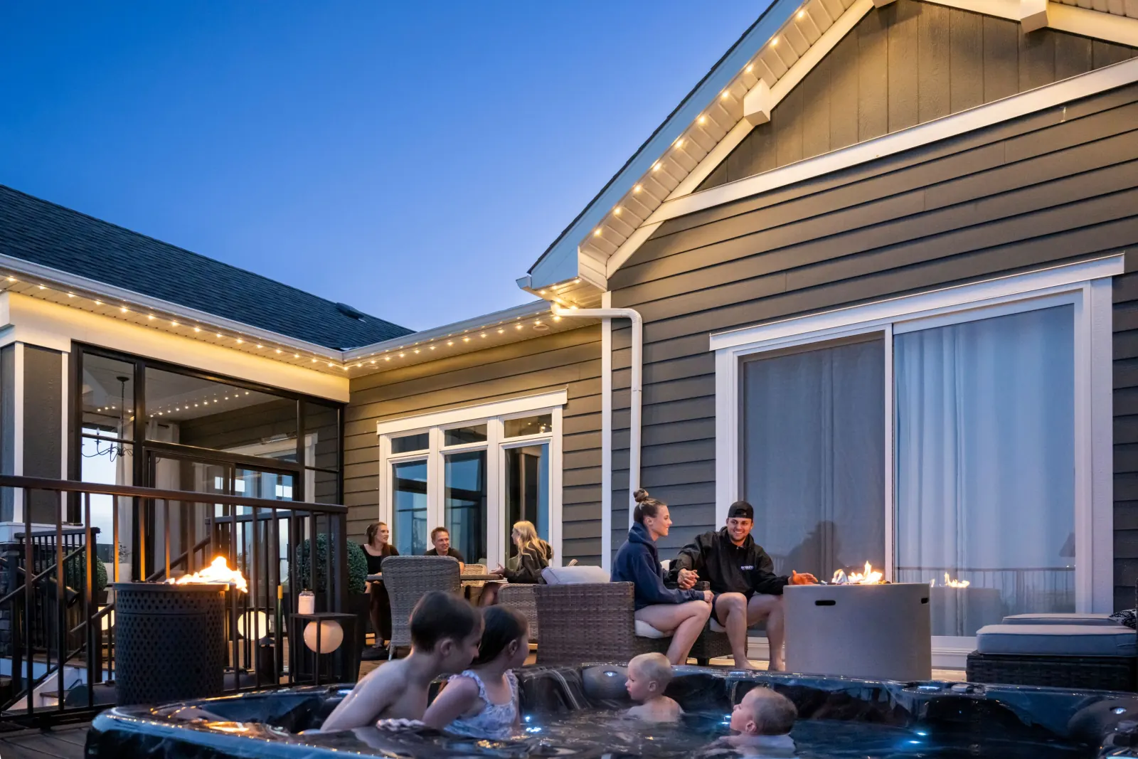 Family enjoying outdoor lighting