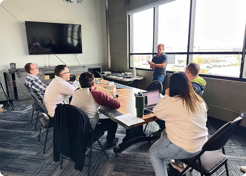 The Gemstone Lights team in a planning meeting