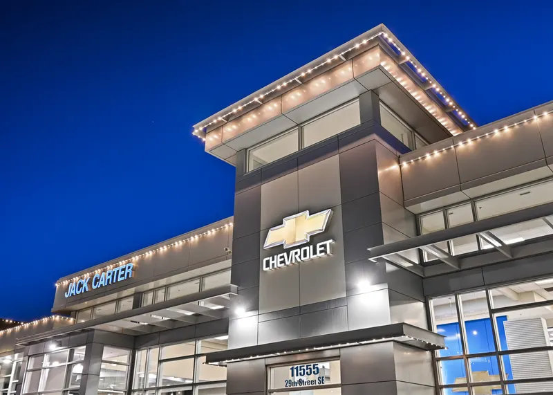 Warm white outlining a car dealership